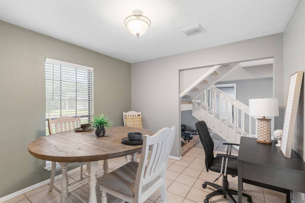 The formal dining room with options. You could use as a office.