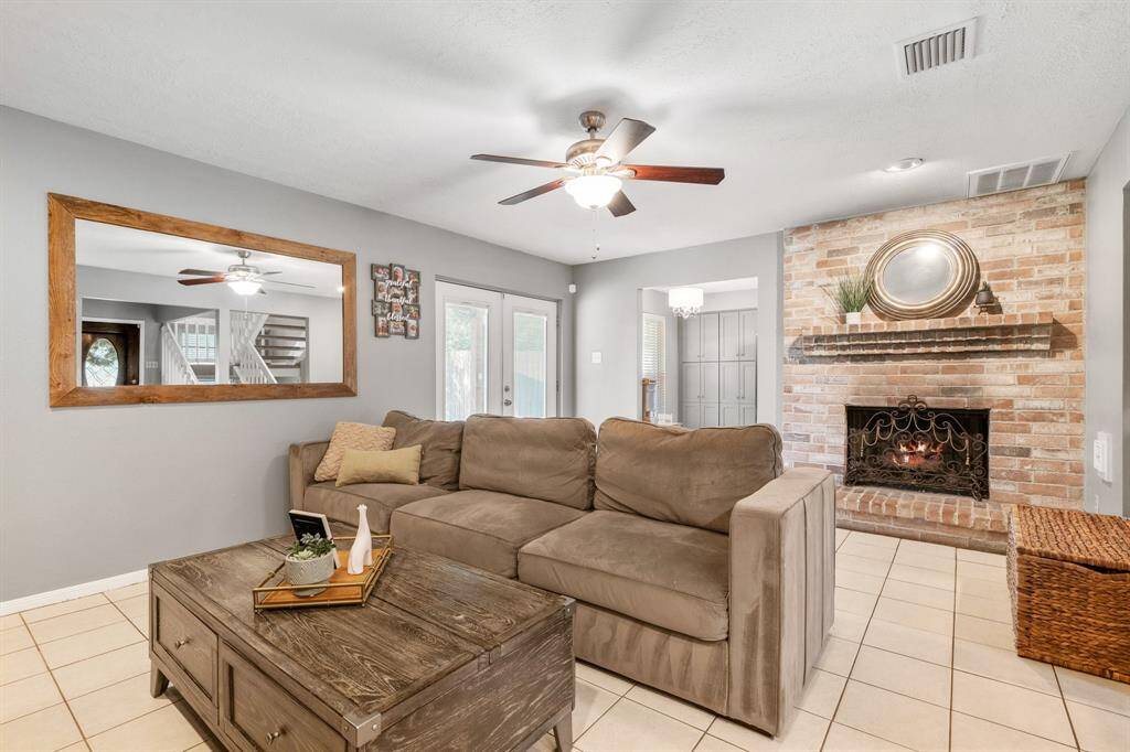 The interior features excellent warm colors an impressive grand fireplace.