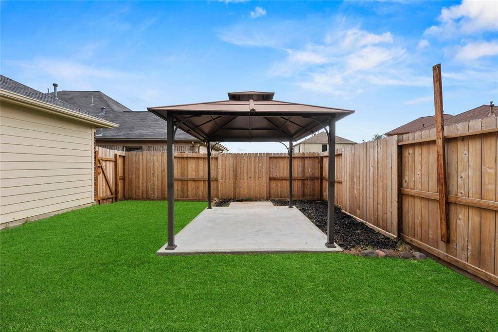 Metal gazebo on cement slab