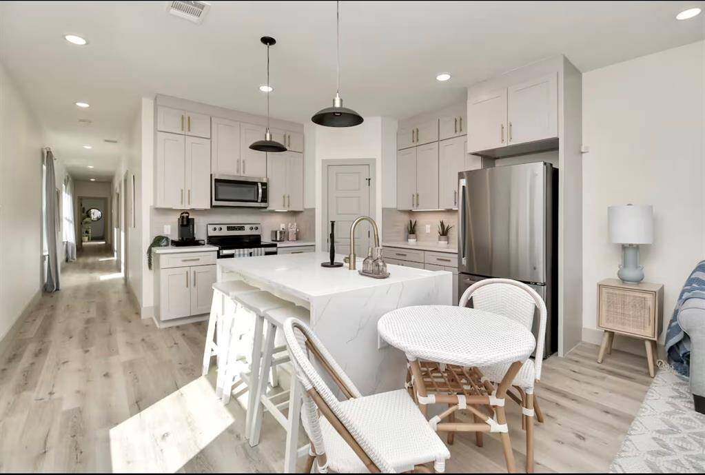 Brand new stainless steel appliances and provide a stylish and functional kitchen.