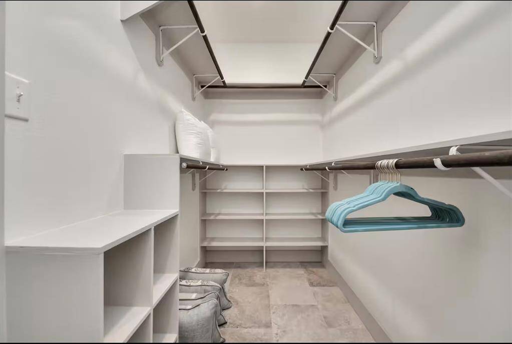 Spacious walk-in closet in Master Bathroom. Perfect storage space for those long term stays.