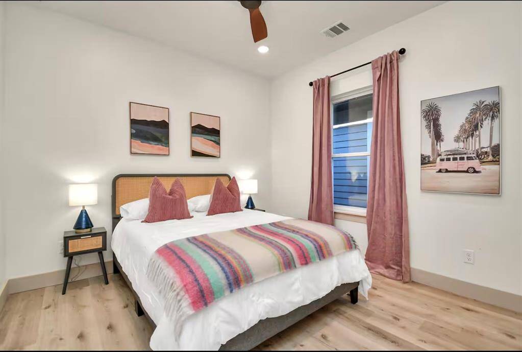 Bedroom 2 - Queen size bed & closet. Has an attached shared bathroom