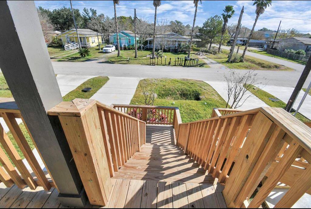 This house does have stairs that lead up to the main living area of the home.