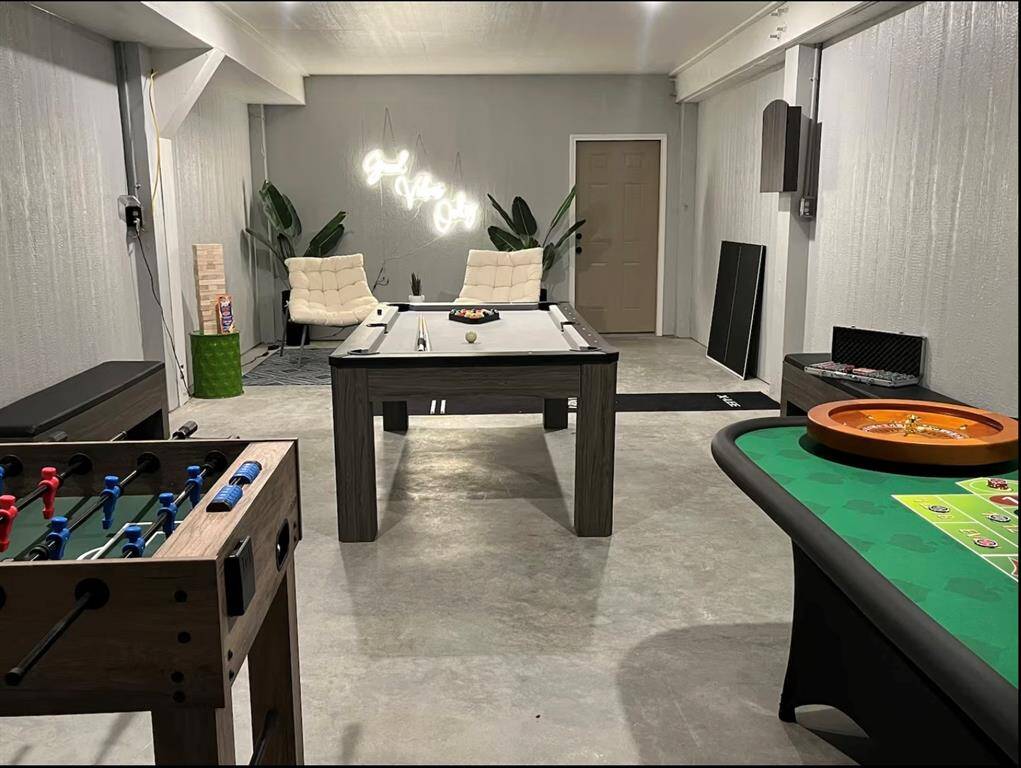 The garage Game Room is the perfect place to spend an evening chilling with the family.