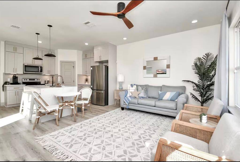The family room comes with a large Smart TV, plenty of natural lighting, and the sofa pulls out into a full size bed.
