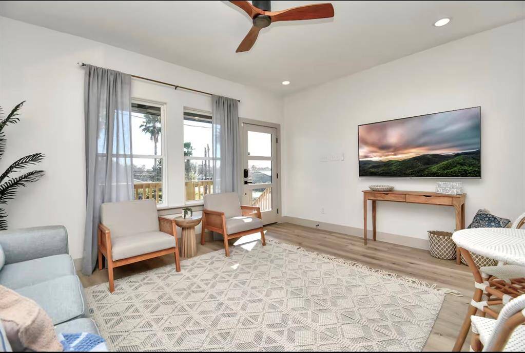 The open concept of the family room creates an environment perfect for relaxation, socializing, and entertaining.