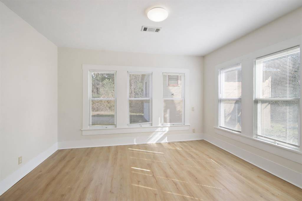 A great place to rest after a long day! This magnificent Primary Bedroom features vinyl plank floors and large window walls with privacy blinds.
