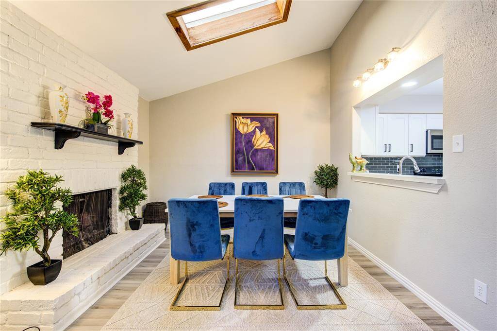Functional Wood-Burning Fireplace & Skyline in the Dining Room