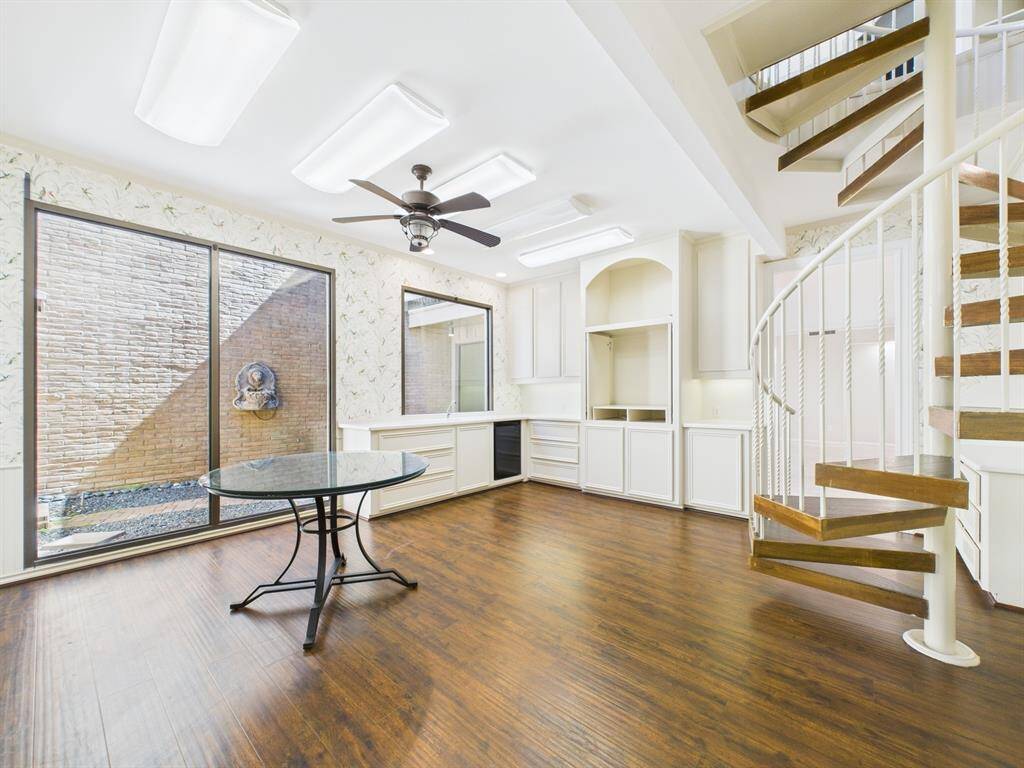 Just beyond the main living area is the breakfast room/wet bar & kitchen