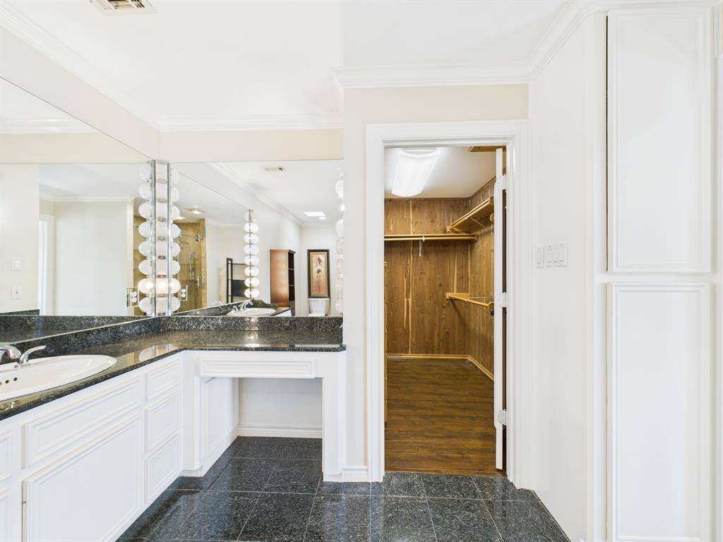Large Sink & Vanity Area plus access to the cedar walk-in