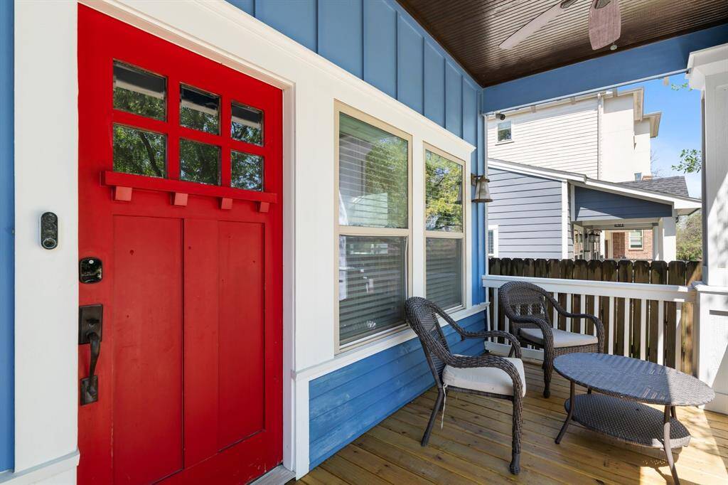 Your favorite place to unwind—this cozy front porch features ceiling fans, integrated speakers, and space to sip coffee or enjoy an evening breeze.