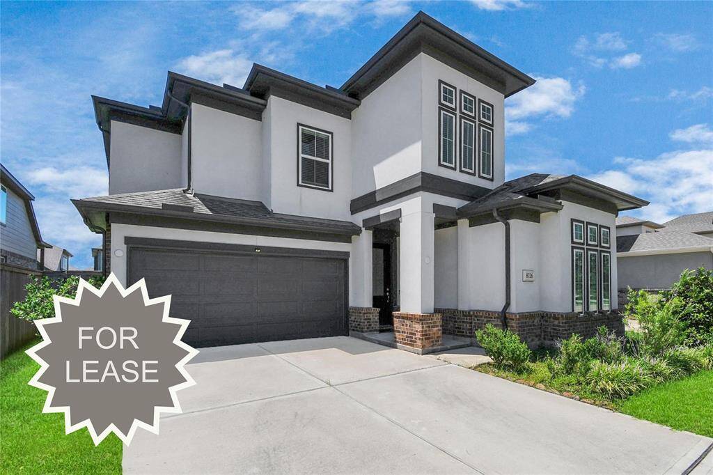 Welcome to 8726 Morris Wood Dr., a stunning two-story stucco home that exudes modern elegance.