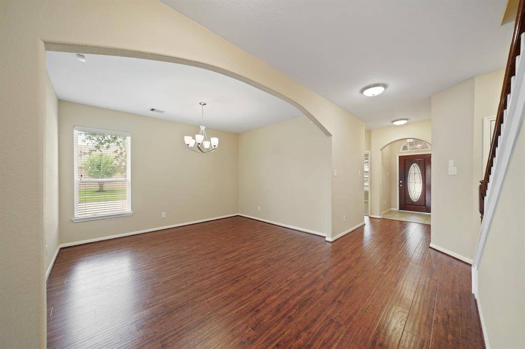 Another view of the foyer and formal area