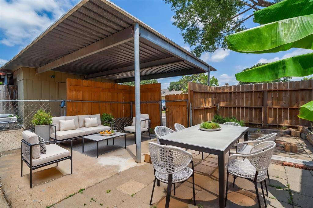 Step into your spacious backyard covered patio perfect for outside living, BBQ pit, patio furniture and more perfect for entertaining.