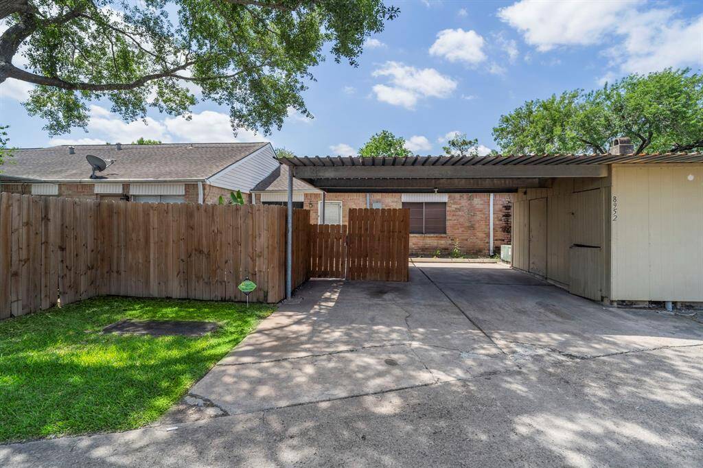 For added convenience, enjoy your own private driveway and covered carport.