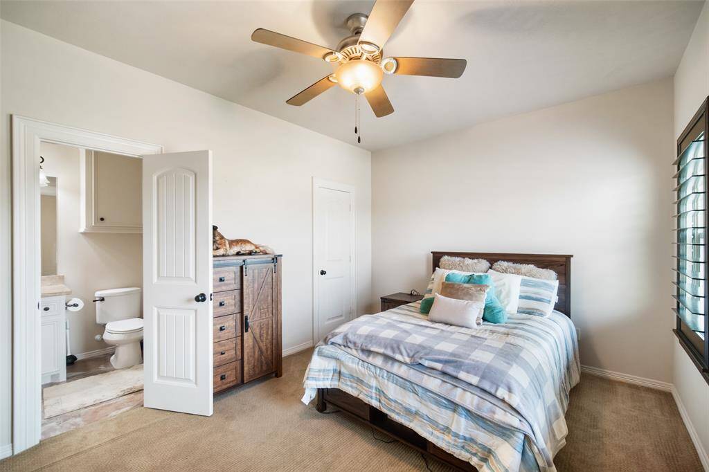 Second floor bedroom with full bath.