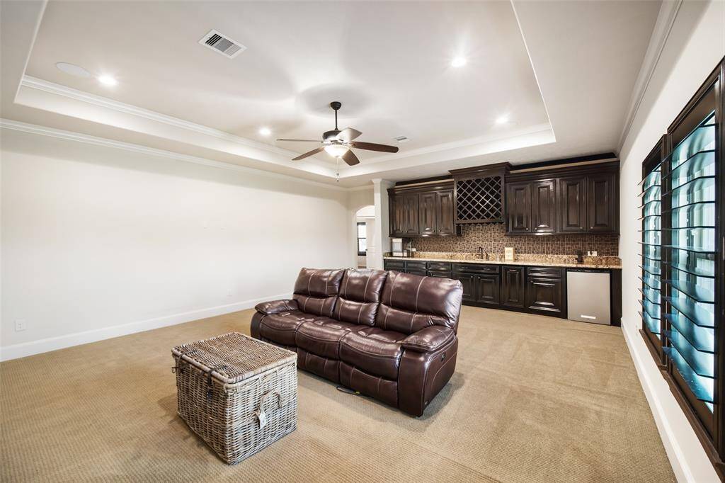 Massive game room with mini kitchen!