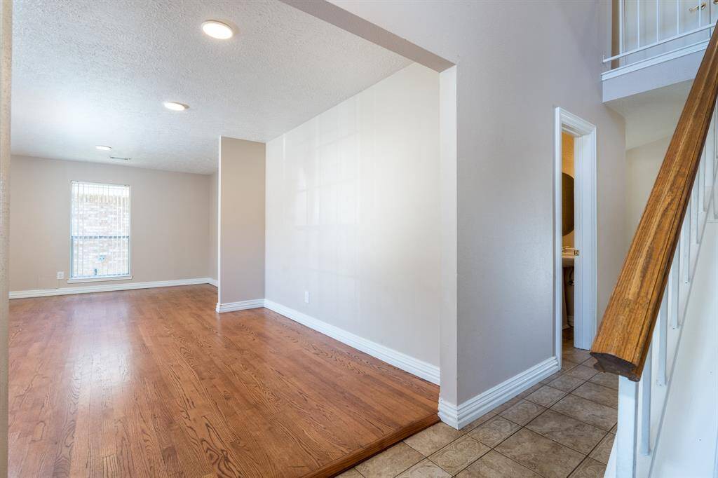 Formal living and dining with beautiful wood floors