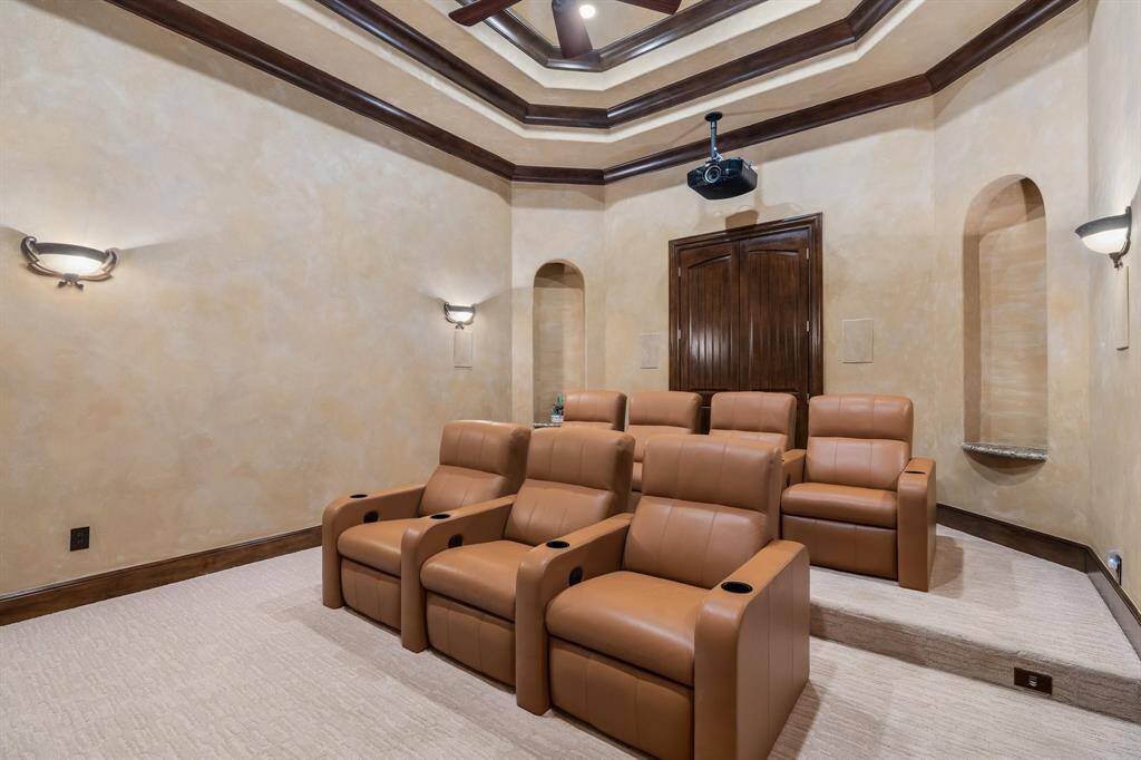 An upgraded media room showcases electronic reclining chairs that convey ... the ultimate in relaxation!