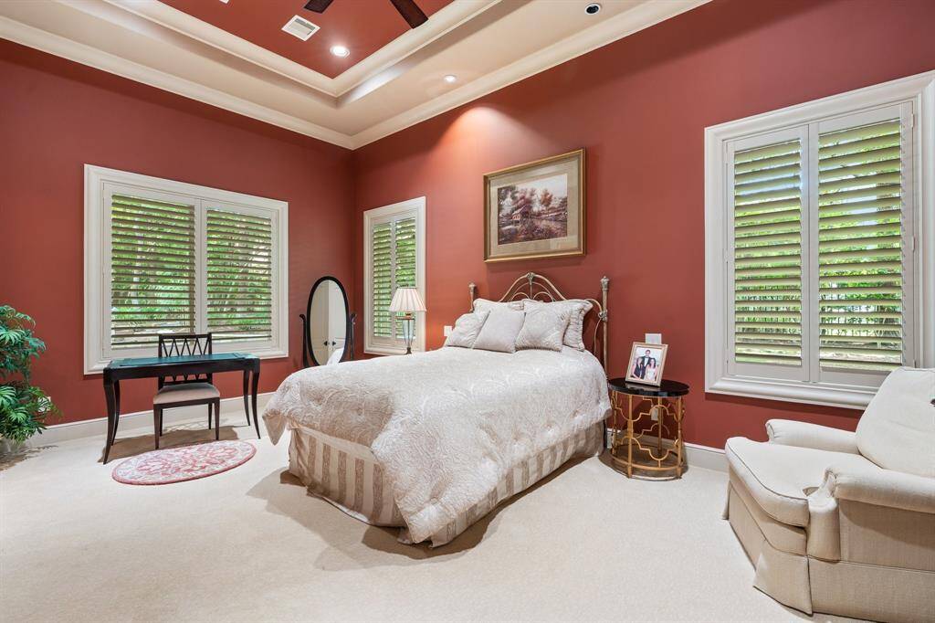 A first floor guest suite is oversized with a spacious walk-in closet and en-suite bath.