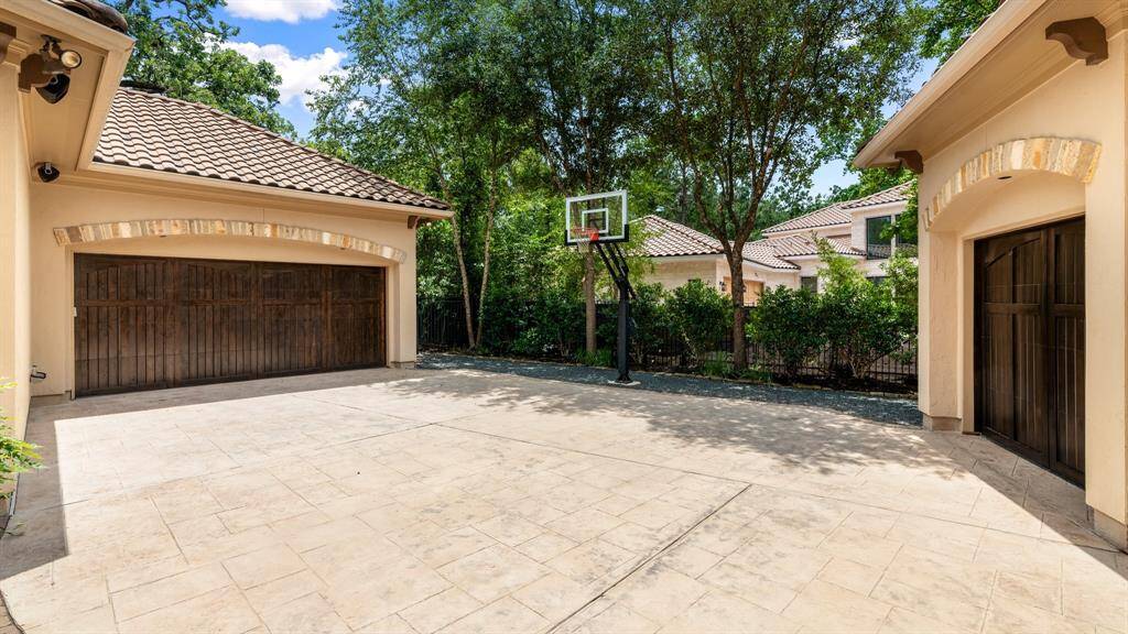 A 2-car and single car garage (epoxy floors) provide 3 bays for covered parking. The single garage is plumbed for those seeking to add a Casita.