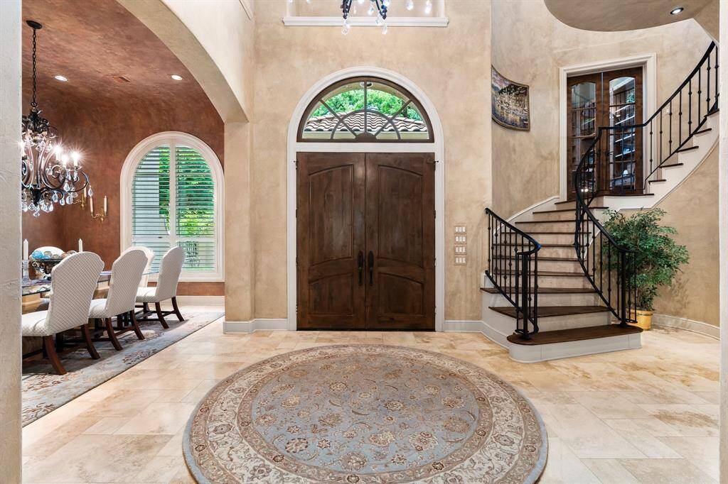 Enjoy beautiful neutral tones and timeless architectural details throughout such as the half story up formal study.