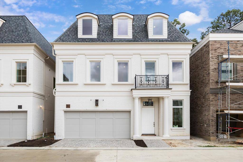 Entry features a solid African Mahogany front door with a glossy lacquered finish, premium Emtek door hardware, and Carroll by Design Boca copper gas lanterns. Painted brick exterior, adorned with trim compliments and accents, along with professionally landscaped front exteriors adds a touch of elegance and further enhance the overall curb appeal of the community.