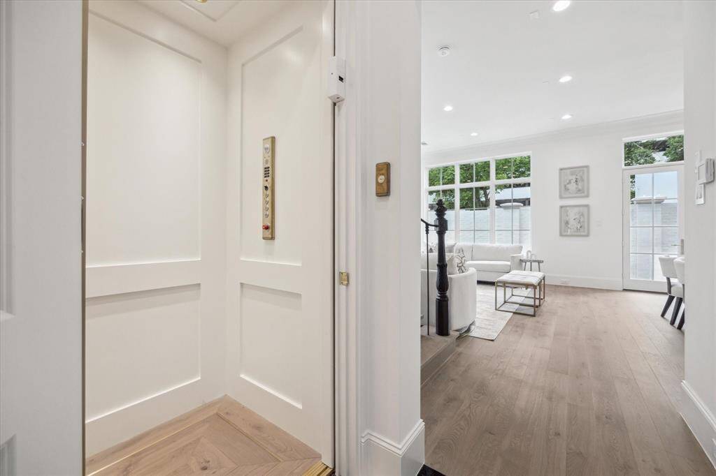 Every home in the community come standard with an existing elevator shaft for easy installation of an elevator in the future. Buyers can choose to upgrade and have an elevator installed and additionally choose from premium elevator finishes, such as wood upgrades, upgraded stainless steel or gold gate, component upgrades, and more. *Photo is of another home in the community and for informational purposes only.
