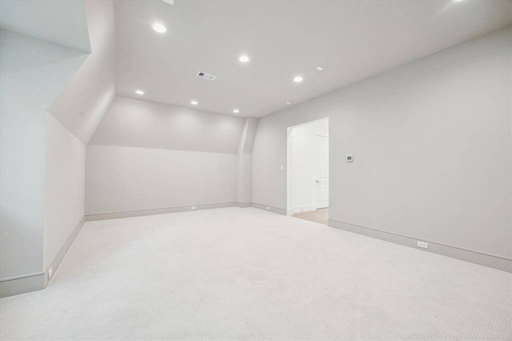 Oversized third floor flex space. Perfect for a gameroom, lounge, office, or more!