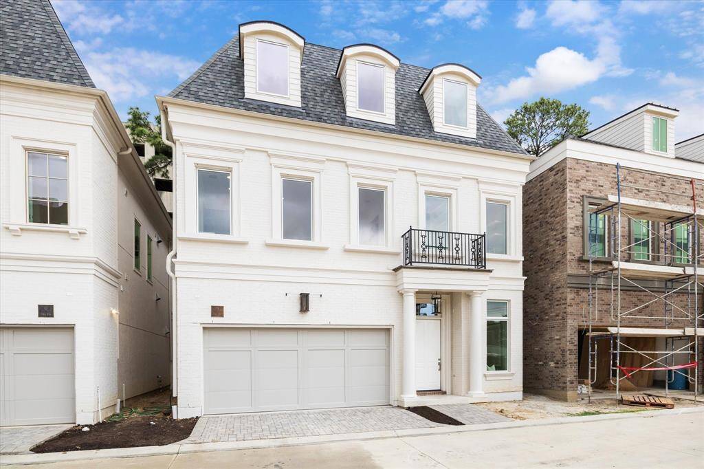 The home is equipped with a Lennox 5-ton zoned HVAC system, two Navien tankless water heaters with a circulating pump and insulated hot water distribution throughout for convenience and modern living.