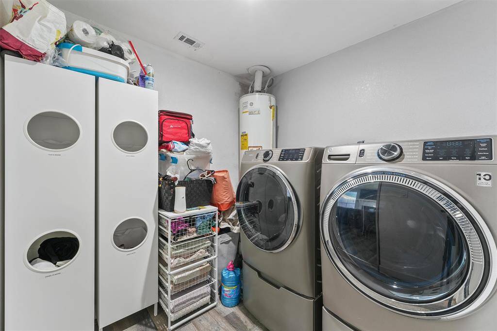 Unlike many homes in the area, this laundry space was thoughtfully added by the current seller—relocated from the garage and now fully enclosed with A/C comfort. No sweating through chores here!