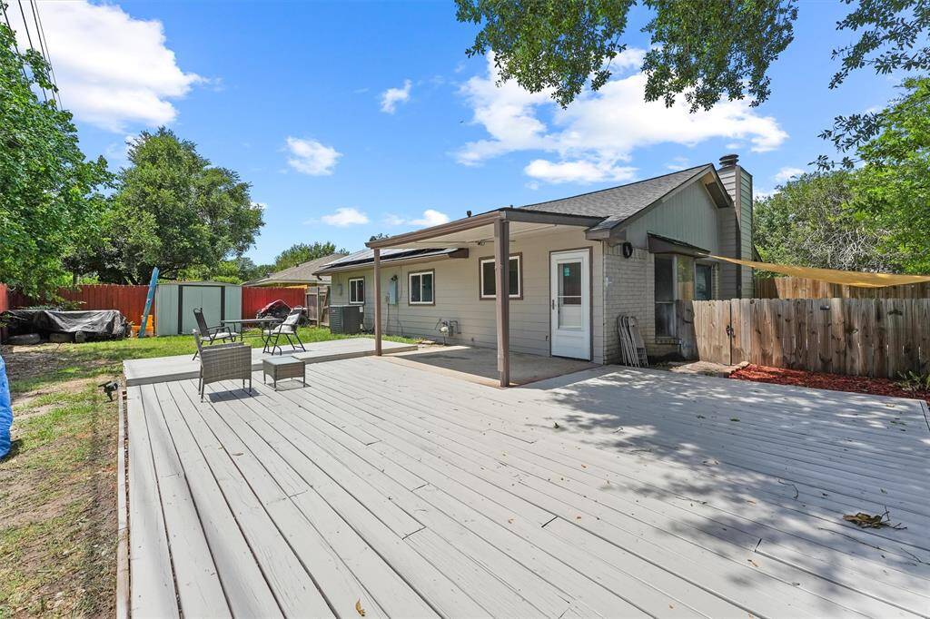 With an oversized deck, shade cover, and plenty of open space, this backyard is perfect for entertaining, playtime, or peaceful outdoor living. There’s room to gather, grill, or garden—your choice.