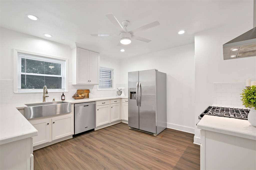 updated kitchen with stainless appliances and lots of natural light