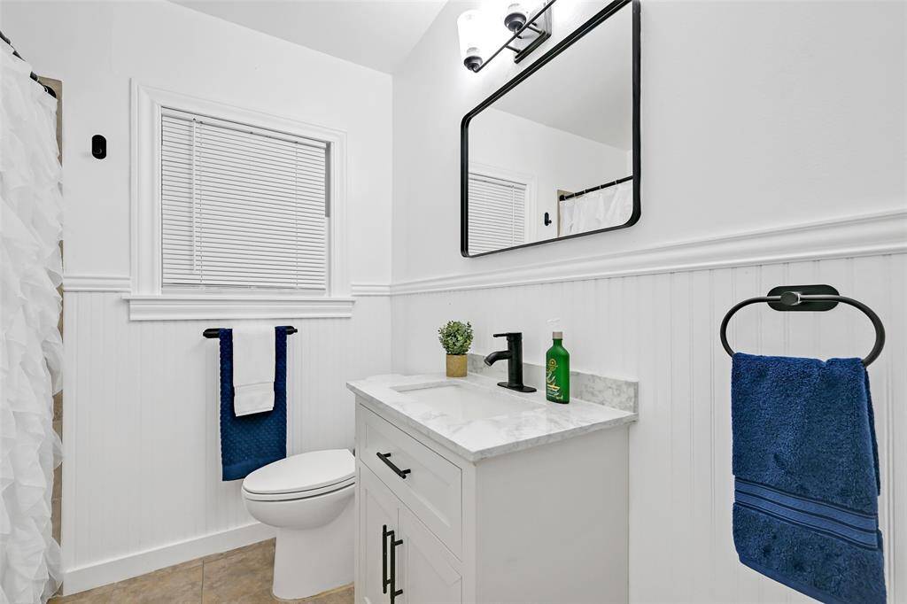 updated bathroom with tub shower combination