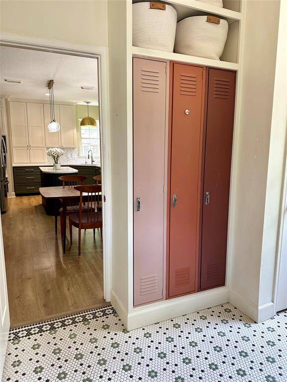 Lockers in the utility room make organizing easy.
