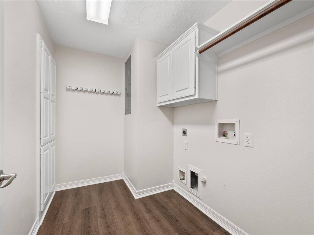Laundry room with built-in storage also DOWN!