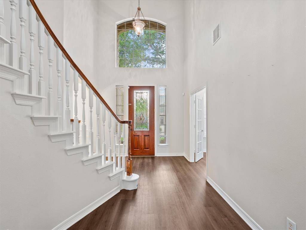 Soaring ceilings in your foyer & new paint throughout!