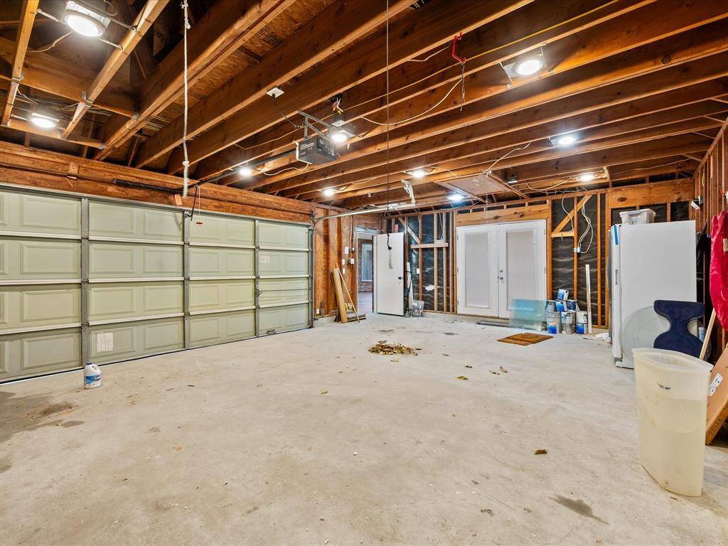 Spacious detached garage with french doors installed for other possibilites!