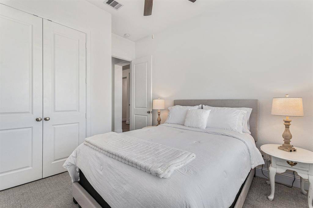 A private bedroom featuring an en suite bathroom for ultimate comfort.