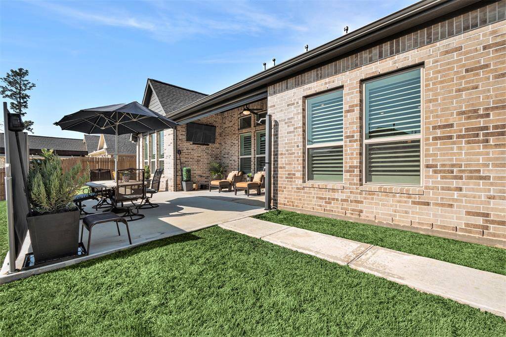 Expansive backyard perfect for relaxation and entertaining.
