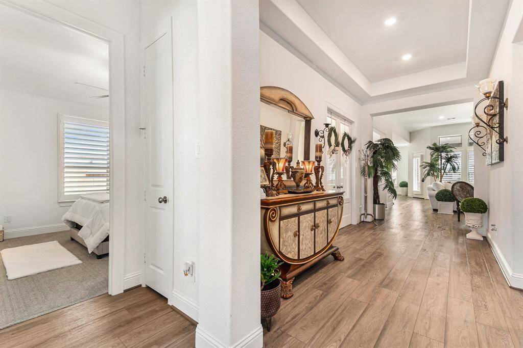 Welcoming entrance with elegant decor and abundant natural light.