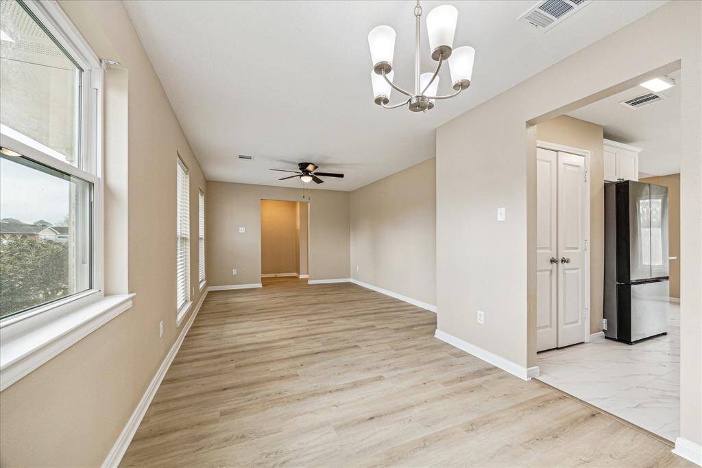 Another view looking from the dining room into the formal living room.