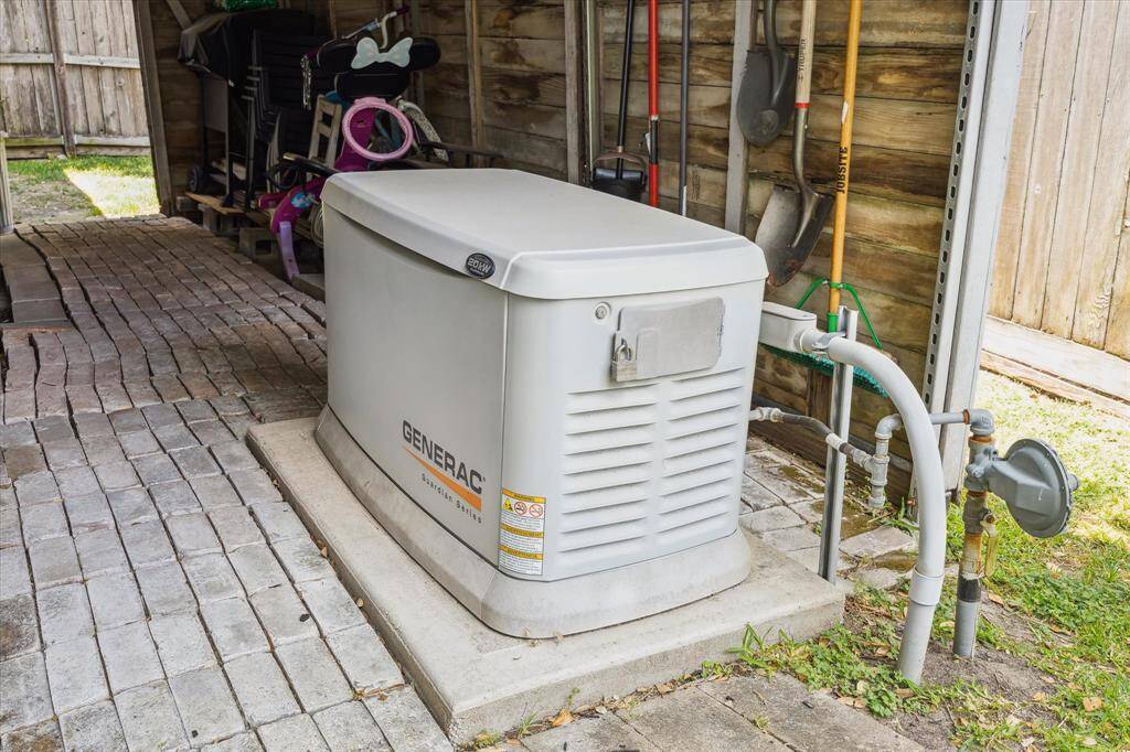 This home features a Generac backup generator connected to the home's utilities, providing reliable power during outages.