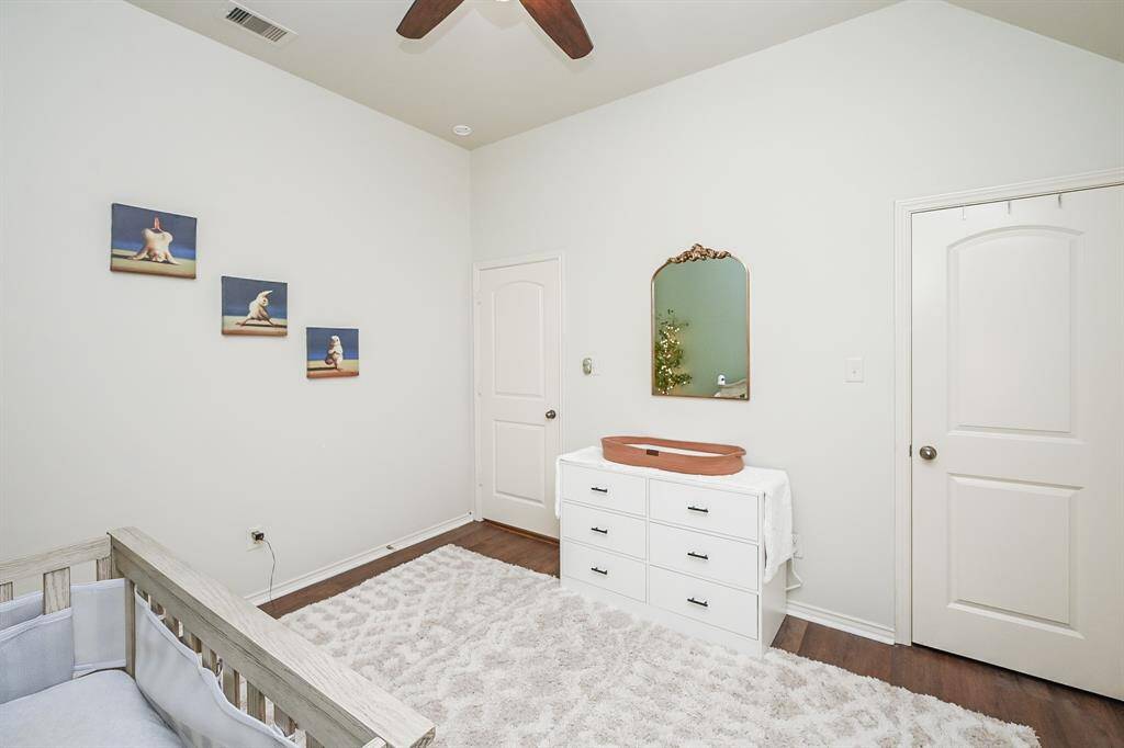 Ample room for furniture, the door on the left leads to the hallway while the door on the right opens to the closet.