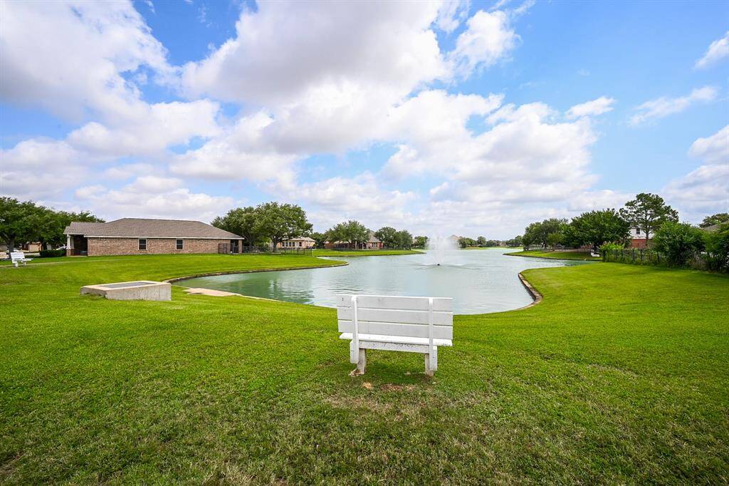Walk 1 minute to this restful lake just down the street from your front door!  Quiet and calm, a great place to relax outdoors or read a book while you take in the serene view.