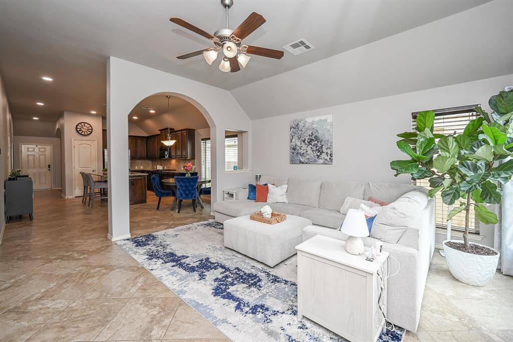 Impressive coffered ceiings and neutral colors throughout the home. Tile floors and ceiing fans offer easy maintenance and comfortable living.