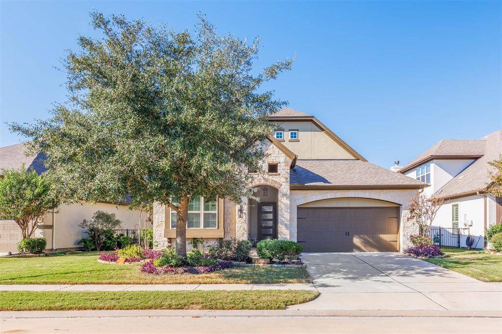MAGNIFICENT Sitterle home on a greenbelt lot featuring 4 bedrooms, 3 full baths and 2 car garage. The spectacular light & bright home will impress you with its beautiful architecture, trending style and high-end finishes including beautiful wood flooring, high tray and coffered ceilings and custom blinds.