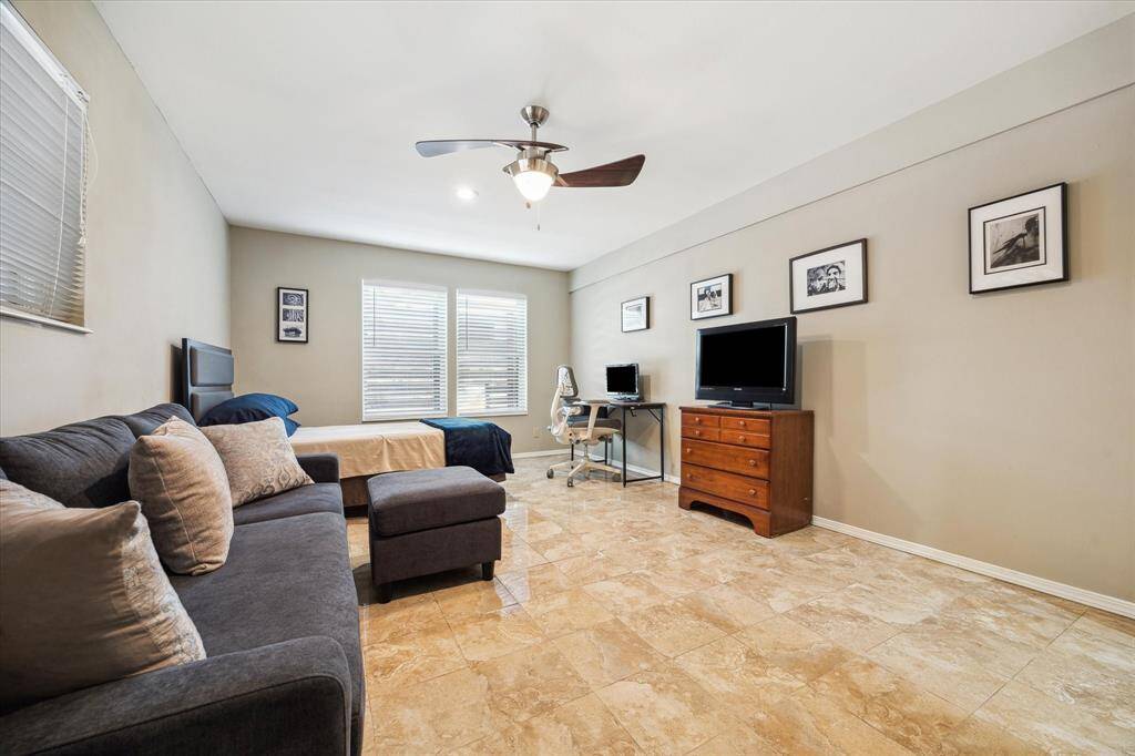 Front House:  Another view of the second bedroom. Ample space for bedroom furniture and sitting area.