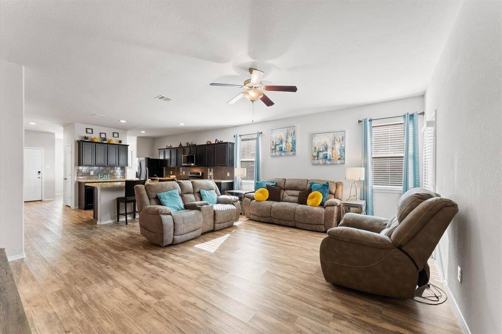 Large family room open to the kitchen.