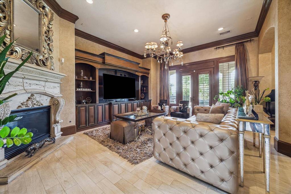 Another view of the family room and French door access to the covered lanai